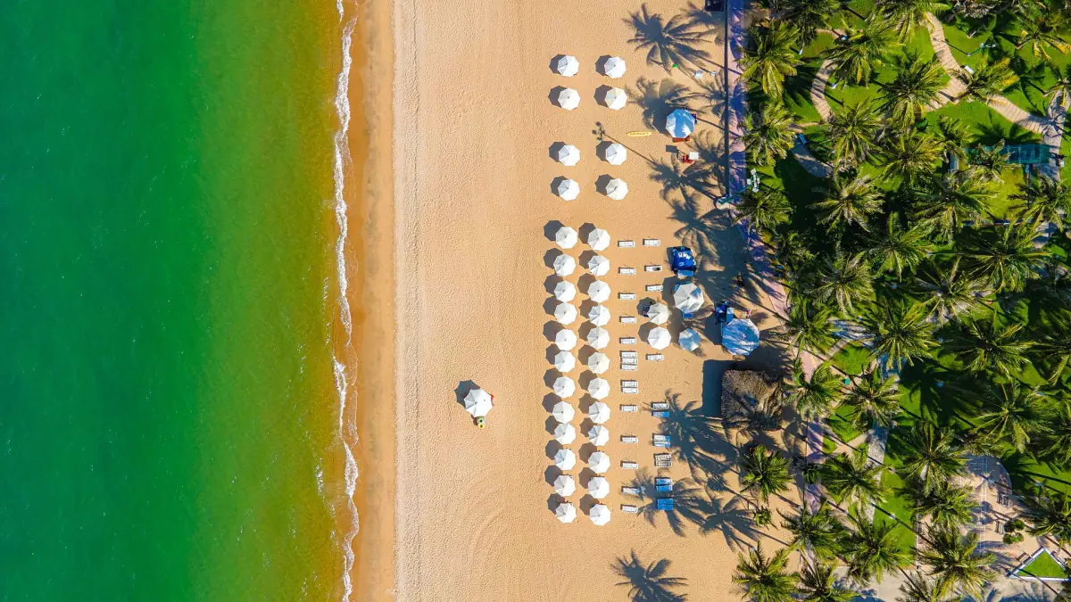 Sun umbrellas on Tran Phu beach from above